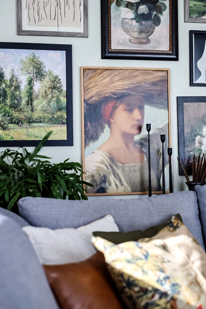gallery wall picture of a woman with basket on her head