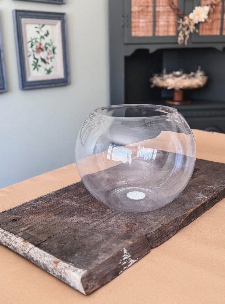 a large glass bubble bowl on table