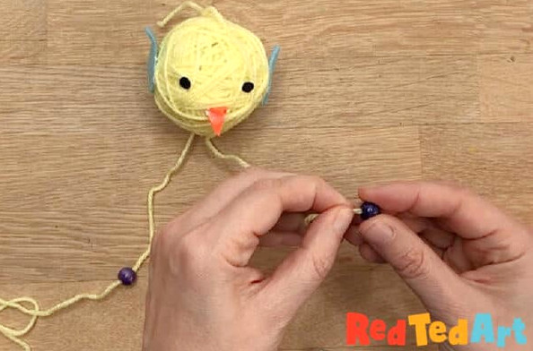 thread on the second bead