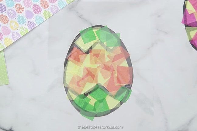 Add Laminating paper on top of Easter Suncatcher
