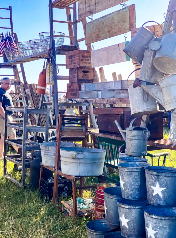 display of vintage pails and cans