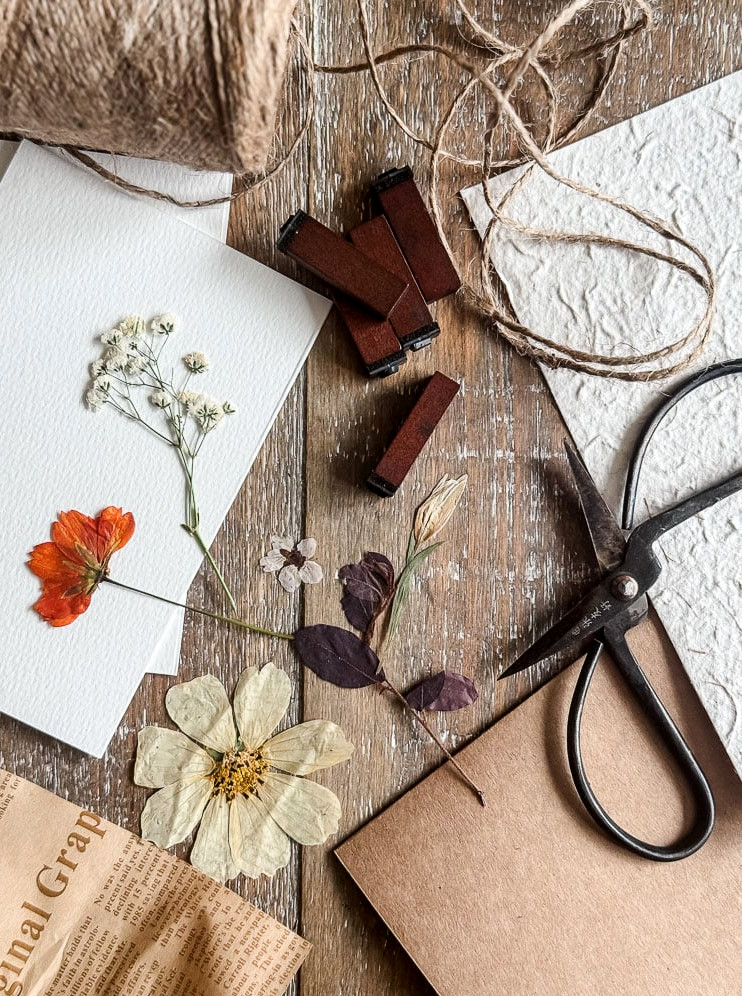 flatlay of craft supplies to make note cards