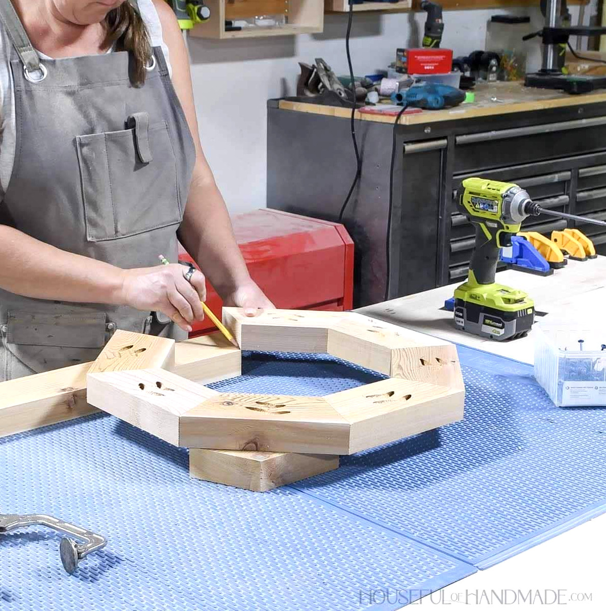 Marking the eighth piece shape on a leftover 2x4.