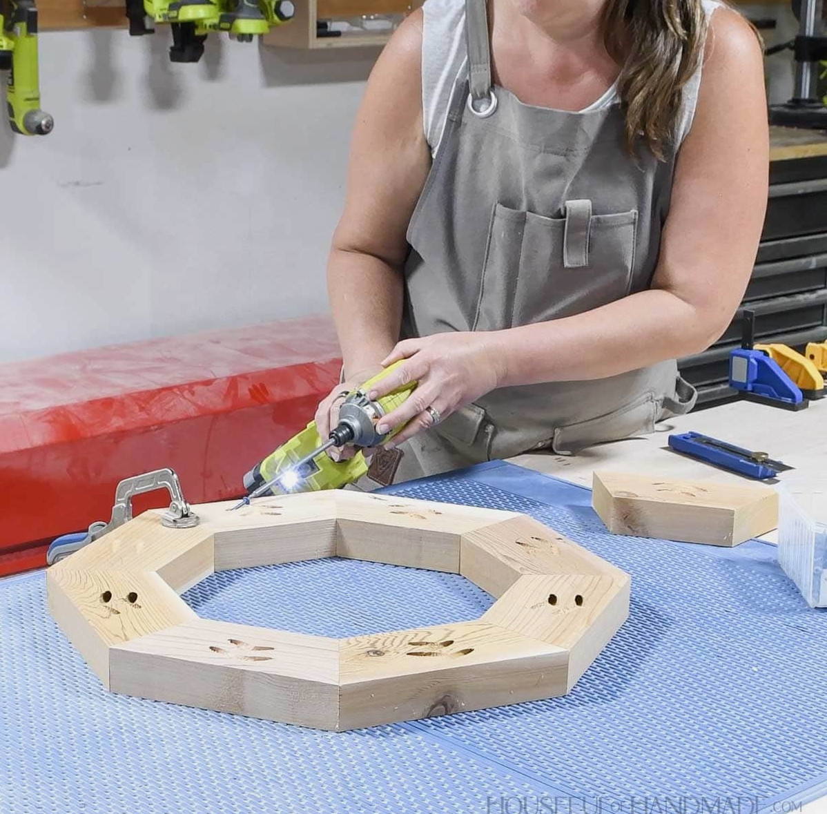 Securing the eighth piece to complete the octagon top.