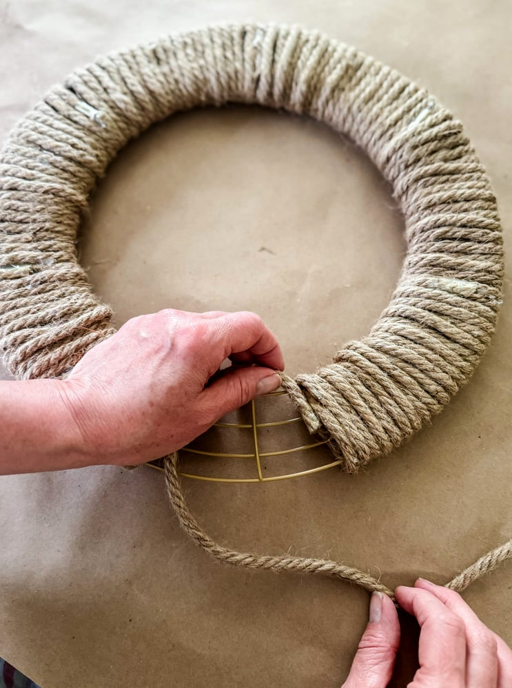 wrapping rope around wreath
