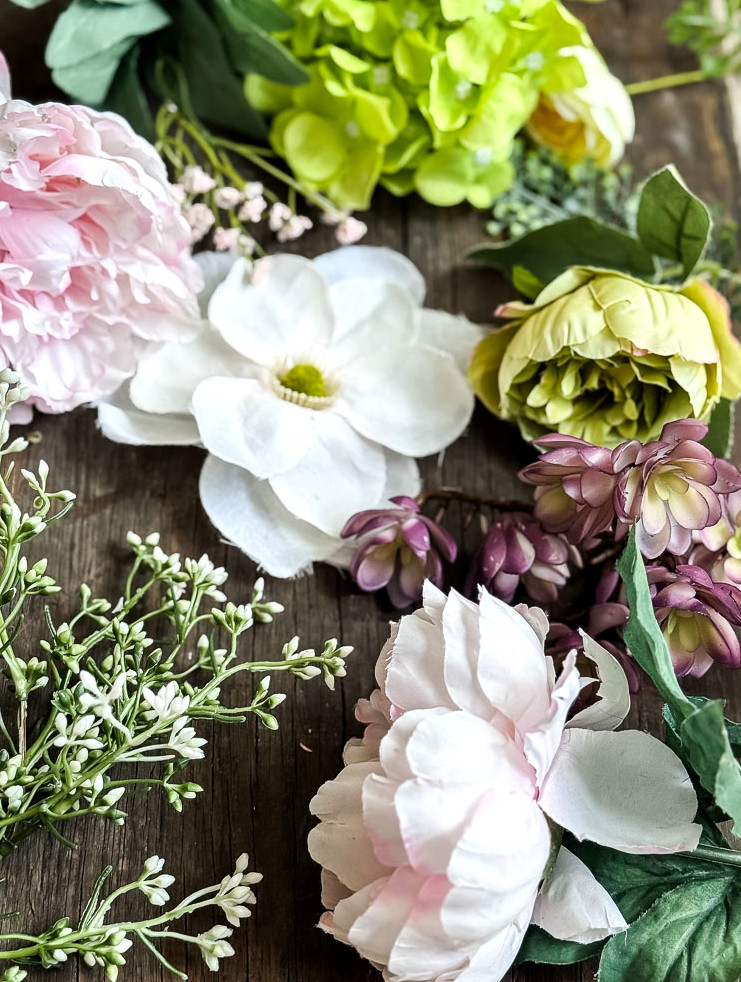 a flatlay photo of faux flowers