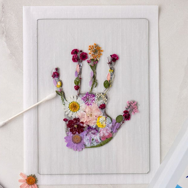 Clean up mod podge around handprint