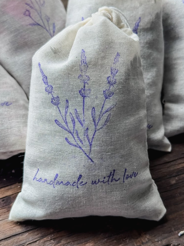 handcrafted lavender sachet inside a stamped muslin pouch