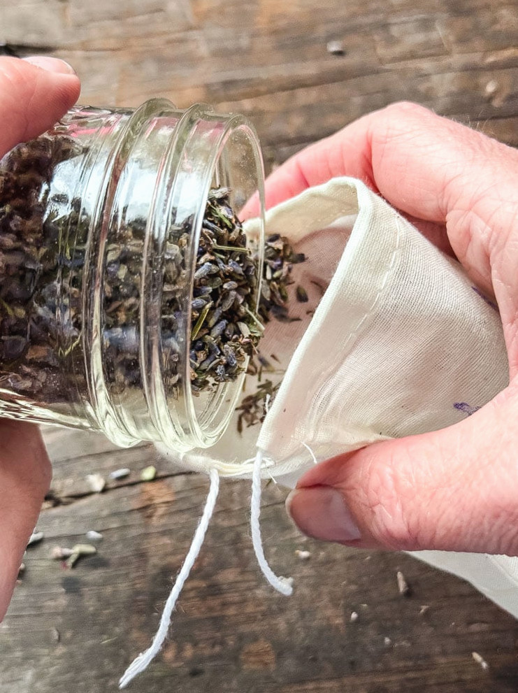 filling a sachet with lavender