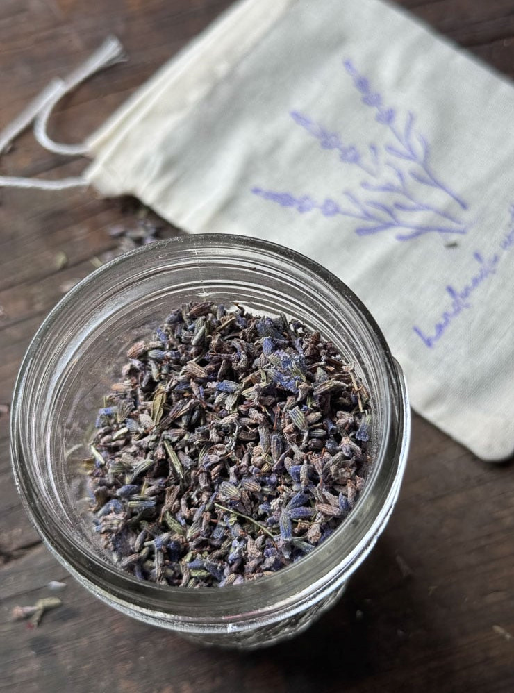 supplies to make lavender sachet, a jar of lavender and muslin bag