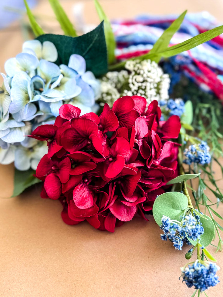 red, white, blue faux flowers