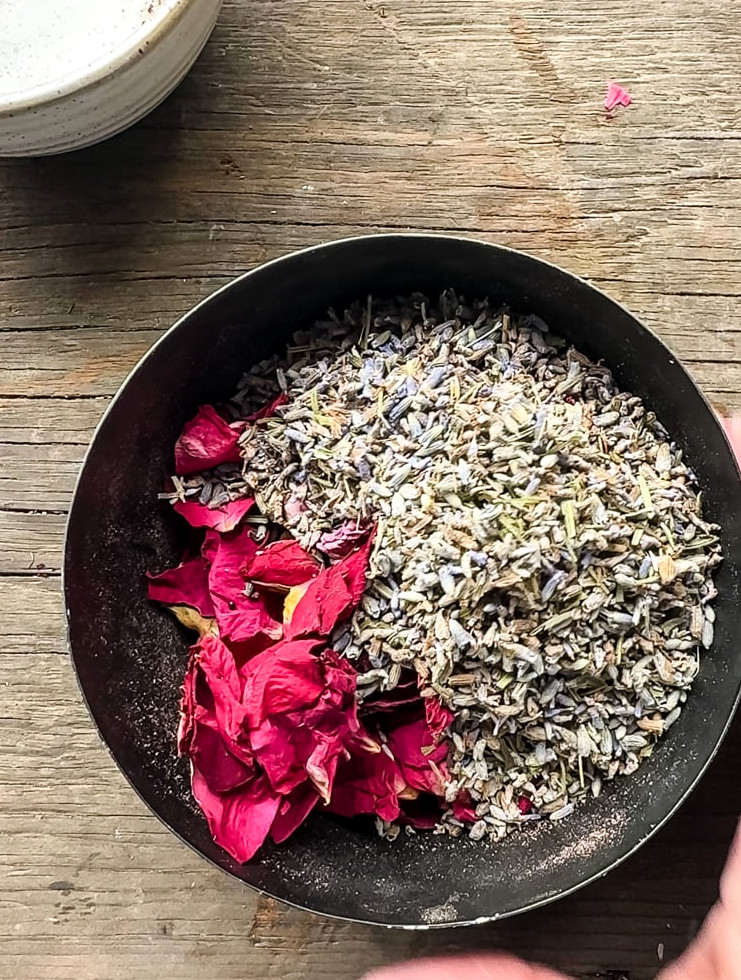 rose petals and lavender buds in a metal dish
