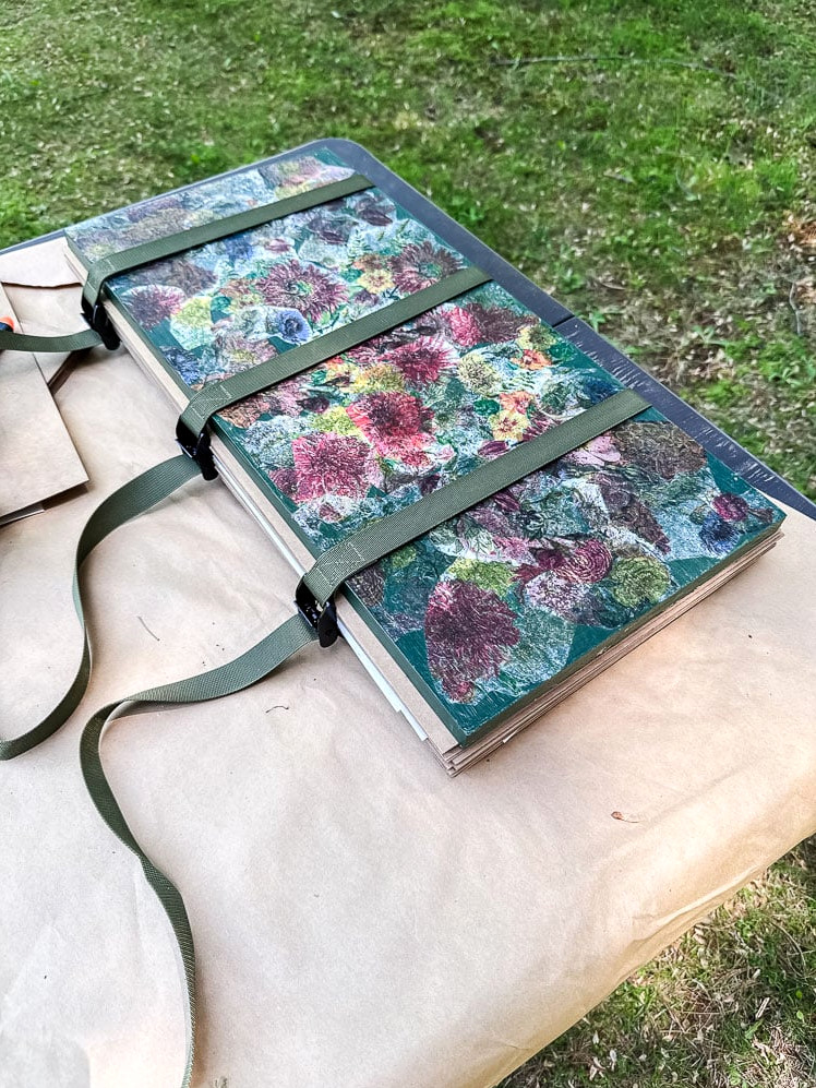 a large flower press with decoupaged surface