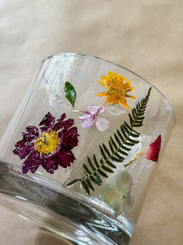 pressed flowers on a glass vase