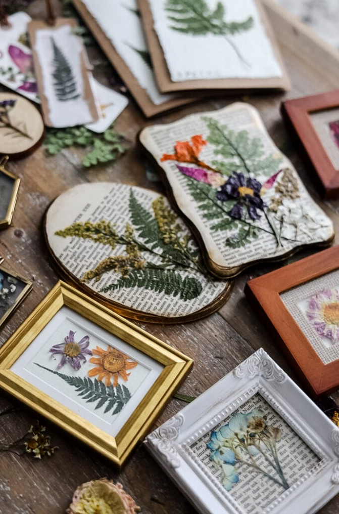 an assortment of art made with press flowers